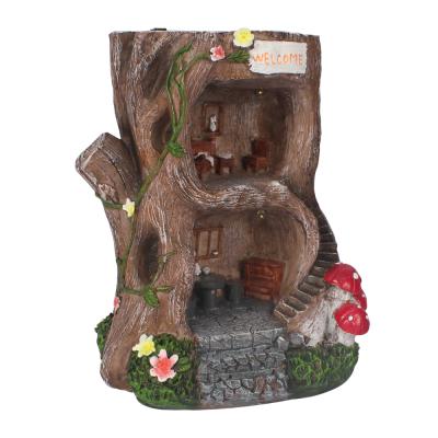 China Europe Custom Resin Garden Statue Fairy House Figurine, Treehouse with Solar LED Lights for Indoor Outdoor Patio for sale