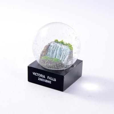 China Europe Custom Resin Vintage Falls Zimbabwe Snow Globe Music Snow Globes Resin Art for sale