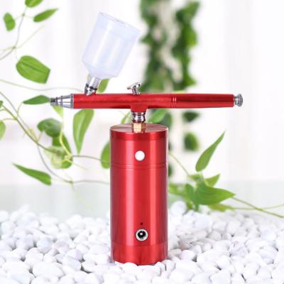 China Cheap Rechargeable Wireless Gravity Powered Airbrush Makeup Airbrush Body Painting Cake Airbrush Kit for sale