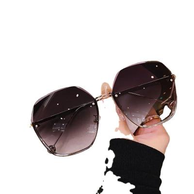 China New 2022 New Edge Sunglasses Fashion Glasses UV Glass Screen Protector Women's Large Face Frameless Cut Thin Glass Sunglasses Fashion for sale