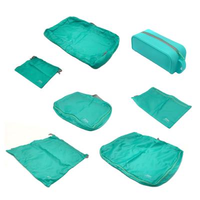 China Foldable Hot Selling Reusable Silicone Clothing Storage Bag Seven-Piece Set for sale