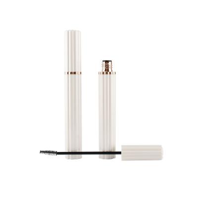 China HUAYI China Logo Hot Stamping Plastic Packaging Custom Empty White Cosmetics Bottle Mascara Tube With Magic Wands White Mascara Tube for sale