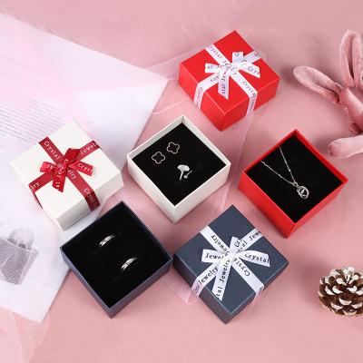 China Recyclable Creative Gift Jewelry Box Ring Necklace Earrings Square Bow Gift Box for sale