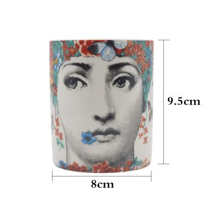 China Italian Home Decorative Ceramic Jar Ornaments Human Face Decoration Scented Candle Jar Storage for sale