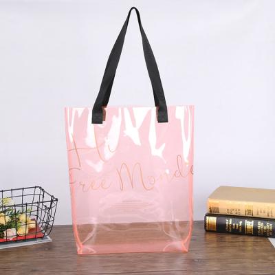 China Fashion PVC Handbag New Transparent Waterproof PVC Clear Bag Eco-Friendly Holographic Waterproof Durable PVC Purse Woman Shopping Pink for sale