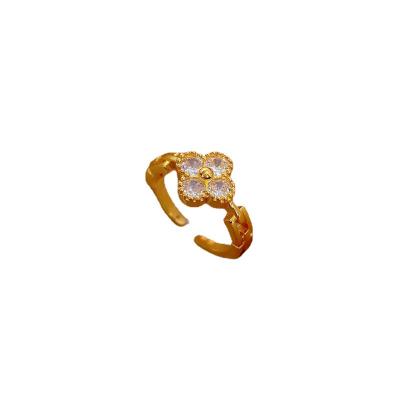 China Romantic Brass Zirconium Inlaid Gold Plated Open Ring Jewelry Four Leaf Flower Ring Women's Jewelry for sale