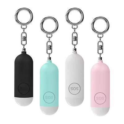 China 140db Emergency Self Defense Alarm Keychain Safety Defence Key Chain Led Security Personal Alarm Keychain For Women for sale