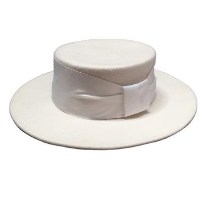 China Formal Ribbon Band Ivory Wool Fedora Hats For Women Men Tourtiere Hats Flat Brim Wide Straw Hat for sale