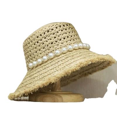 China Striped Women Hollow Out Style Beads Gather Raffia Straw Hat Fringed Wide Brim Sun Ladies Hat Summer Beach Hat for sale