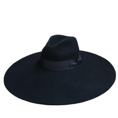 China 16cm Big Wide Brim Casual Wool Felt Fedora Chic Floppy Warm Winter Trilby Ribbon Bowknot Church Dress Wedding Jazz Hat for sale