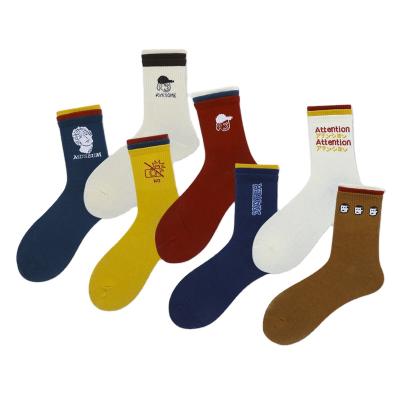 China Cheap Happy Logo Tube Skateboard Socks Funny Crew Custom Made Popular Creative Wholesale QUICK DRY Cotton For Women Men for sale