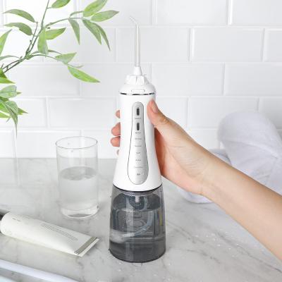 China Hotel 5 Modes Portable Oral Water Jet Flosser Electronic Irrigator USB Rechargeable Wireless Oral Water Flosser for sale