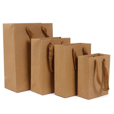 China Customized wholesale high quality flat brown bag recycled material factory LOGO handle kraft paper kraft paper bag with logo for sale