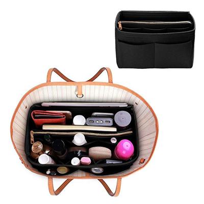 China Portable Felt Sustainable Travel Lady's Portable Cosmetic Bag Storage Bag for sale