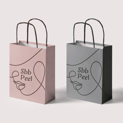 China Recycled Materials Low Price Offset Printing Coated Paper Gift Bags Custom Gift Bags With Logo for sale