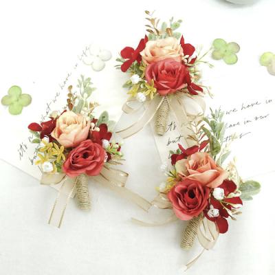 China Home Decoration/Festival/Valentine/Wedding/Ending Wedding Red Color Rose Corsage Bridal Set With Green Leaves Wrist Flowers For Wedding for sale