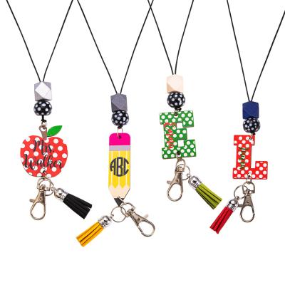 China Fashoin Personalized Colorful Apple Acrylic Charm Pencil Lead Chain Teacher Lanyard for sale