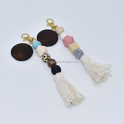 China Fasion Monogram Wooden Disc Beads with Cotton Key Chain for sale