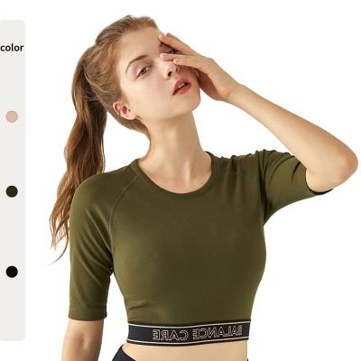 China New Women Yoga Blouse Half Sleeve Letter Strap Original Crop Quick Dry Tight Slim Breathable Wholesale Yoga Top Active Wear for sale