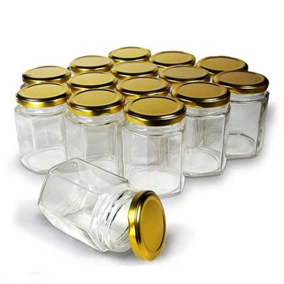 China Factory Price Glass Eco - Friendly Food Storage Glass Jar With Gold Color Lid for sale