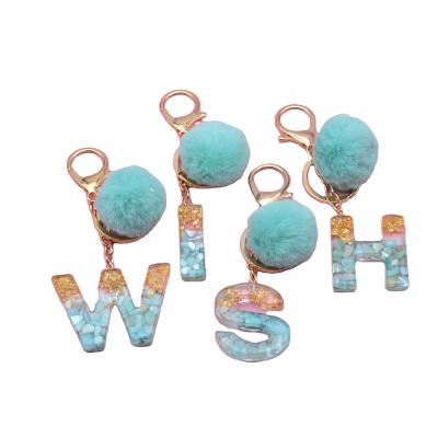 China Acrylic Resin Pendant Stone Key Chain Gold Foil Tassel Chain Alphabet Key Chain With Tassel for sale