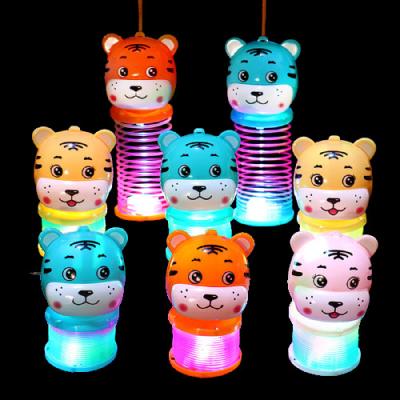 China 2022 Portable Tiger Glowing Stretch Rainbow Circle Spring Cartoon Tiger Rainbow Circle Lantern Children Fun Toys Ring Toy for sale