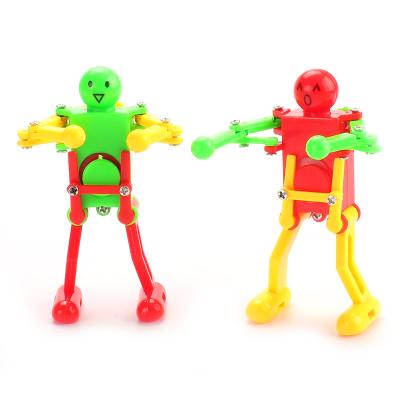 China Widely Used Hot Selling Promotional Wind Up Toys Small Dancing Cogs Robot Toy For Kids for sale