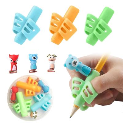 China 3pcs Posture Children Writing Correction Corrector Silicone Kids Learning Stationery Gift Writing Correction Tool Kit Two-finger Pencil Holder for sale