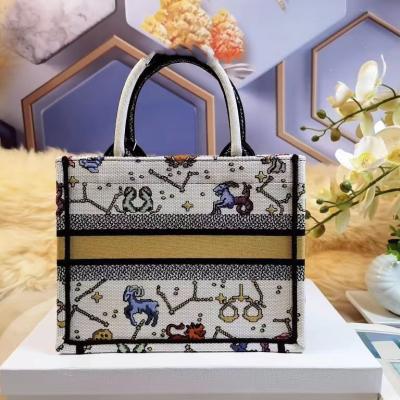 China 2023 High Quality Women's Luxury Senior Embroidery Fashion Top Designer Popular Portable Single Shoulder Bag Tote Bag Cross - Body Bag for sale