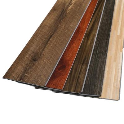 China Modern vinilico pvc spc flooring 4mm-6mm spc vinyl plastic plank fireproof wood flooring for sale