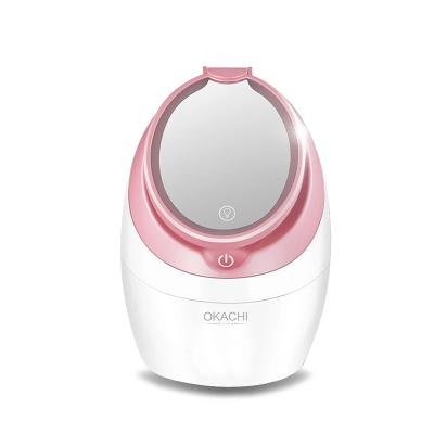 China Portable 80ml Illuminating Unique Design Led Switch Auto-Light Warm Mist Nano Touch Facial Steamer With Mirror for sale