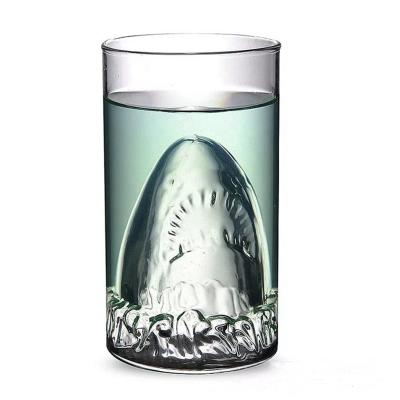 China Creative cold heat resistant glass mug with shark shape bottom for sale