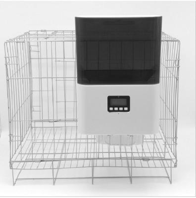 China Automatic Wholesale Pet Food Timing Automatic Cage Feeder Quantitative Pet Feeder for sale