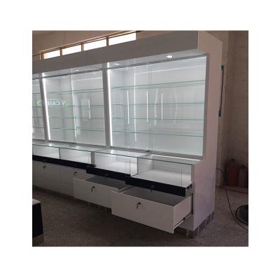 China Pharmacy Store Counter Display Shelving Cabinet With Glass Medical Shop Interior Design Pharmacy Furniture for sale