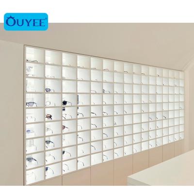 China Newest Fashion Optical Wooden Wall Mounted Sunglasses Rack Shelf Display Cabinet Store Store Names for sale