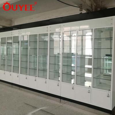 China Store cosmetic cabinet with store layout glass display cabinet and showcase cosmetic store interior design for sale