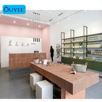 China Wooden Cosmetic Shop Store Shelves Design Skin Care Product Wall Display Rack Metal Skin Care Display Stand for sale