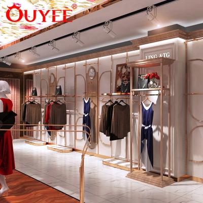 China Women Clothes Shop Latest Graceful High Quality Retail Wooden Clothing Store Display China Clothing Store Furniture Designs for sale