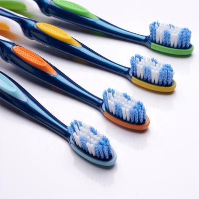 China Spiral Stiffens Adult Manual Extra Clean Medium FROG Toothbrush With Medium Soft Bristle Nylon Toothbrush BPA Free for sale