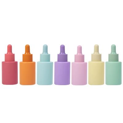 China 30ml cosmetic colored frosted glass dropper bottles with empty pipette eco-friendly liquid perfume container for sale