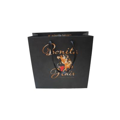 China Recyclable Custom Printed Recycled Black Paper Gift Carrier Bag With Ribbon Handle for sale