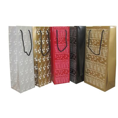 China Customizable wholesale handmade 350gsm color art card printed paper bags with pp handles for sale