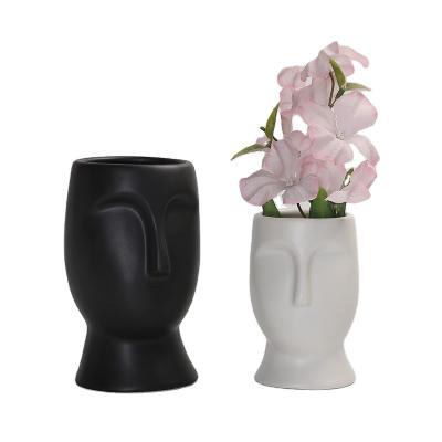 China Eco-friendly Nordic Body Art Ceramic Vase Ornaments Human Style Face Vase Living Room Flower Vase for sale