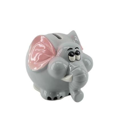 China Save Money Bank Custom Cute Elephant Shaped Ceramic Money Coin Bank Children Coin Bank for sale