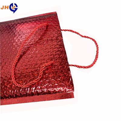 China Customized simple and generous express clothing and heat insulation bubble handbag manufacturer direct selling cosmetics packaging bag for sale