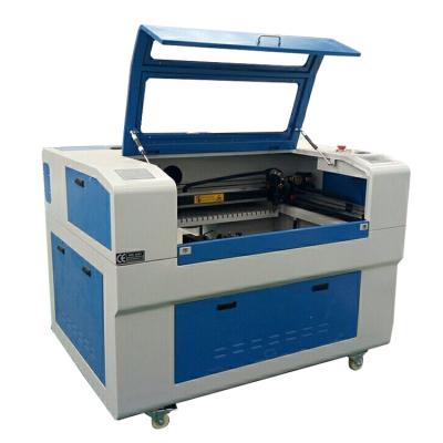 Chine Sundor 1390 60W 80W 100W 130W 150W co2 laser cutting machine price for wood / acrylic / MDF / leather à vendre