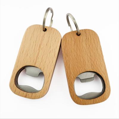 China Custom Made Eco-Friendly White Beer Opener Bottle Opener High Quality Key Chain Natural Wooden Key Chain for sale