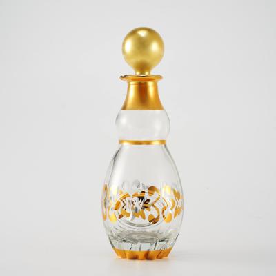 China Personal Care Polished Empty Perfume Glass Bottle 250ml With Gold Decoration for sale