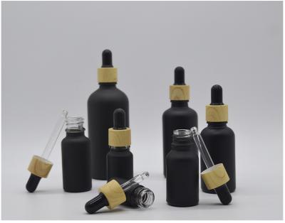 China Luxury Matte Black Colorful Personal Care Glass Dropper Bottles for sale