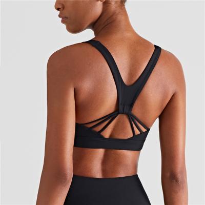 China Women Anti-UV High Yoga Halter Aplet Workout Bra Yoga Support Strappy Sports Bra With Removable Cups for sale